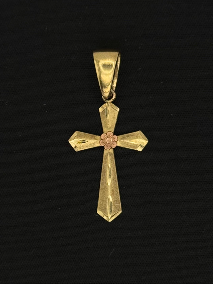 10K GOLD DIA CUT CROSS PENDANT WITH RODE GOLD FLOWER ON.