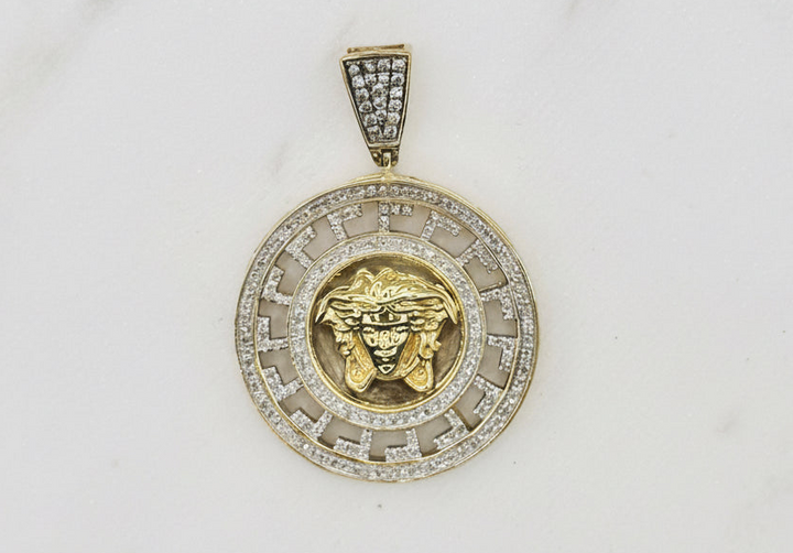 10K GOLD WITH DIAMOND VERSACE PENDANT