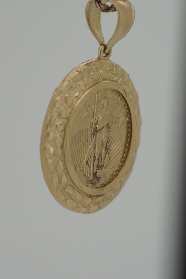 10K YELLOW GOLD LIBERTY WITH NUGGET DESIGN PENDANT