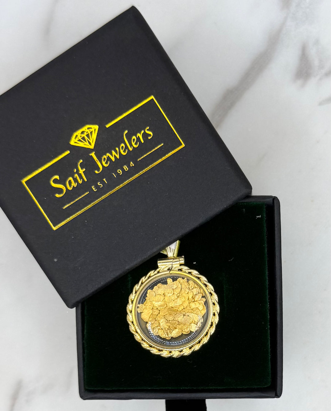 24K GOLD FLAKES ENCASED IN 14K BEZEL PENDANT