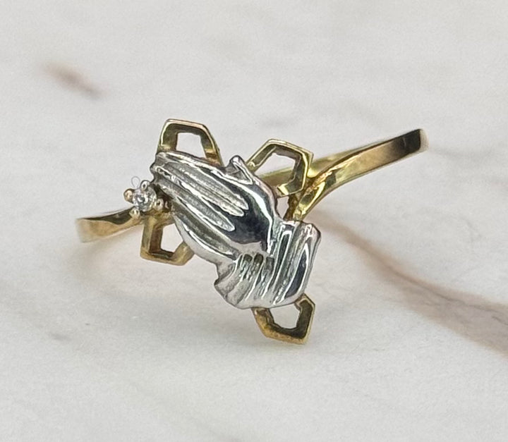 10K GOLD TWO TONE CROSS AND PRAYING HANDS RING