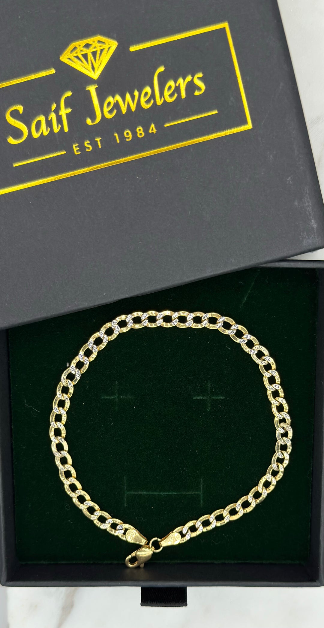 10K Y/G CUBAN WITH DIA CUT HOLLOW BRACELET