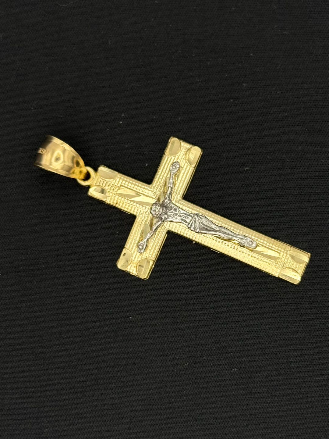 10K GOLD DIA CUT 3D CROSS PENDANT WITH WHITE GOLD JESUS ON IT