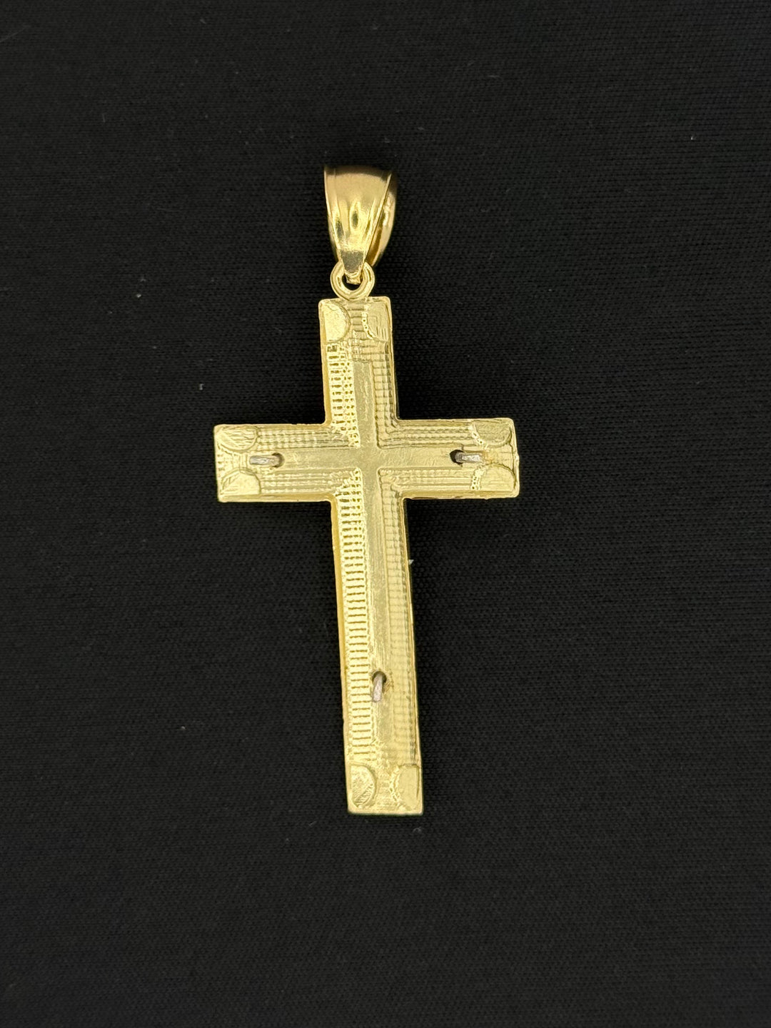 10K GOLD DIA CUT 3D CROSS PENDANT WITH WHITE GOLD JESUS ON IT