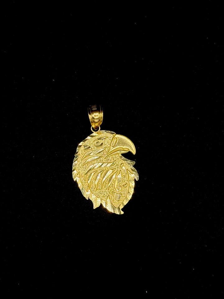 10K GOLD EAGLE HEAD WITH BORDER DIA CUT PENDANT