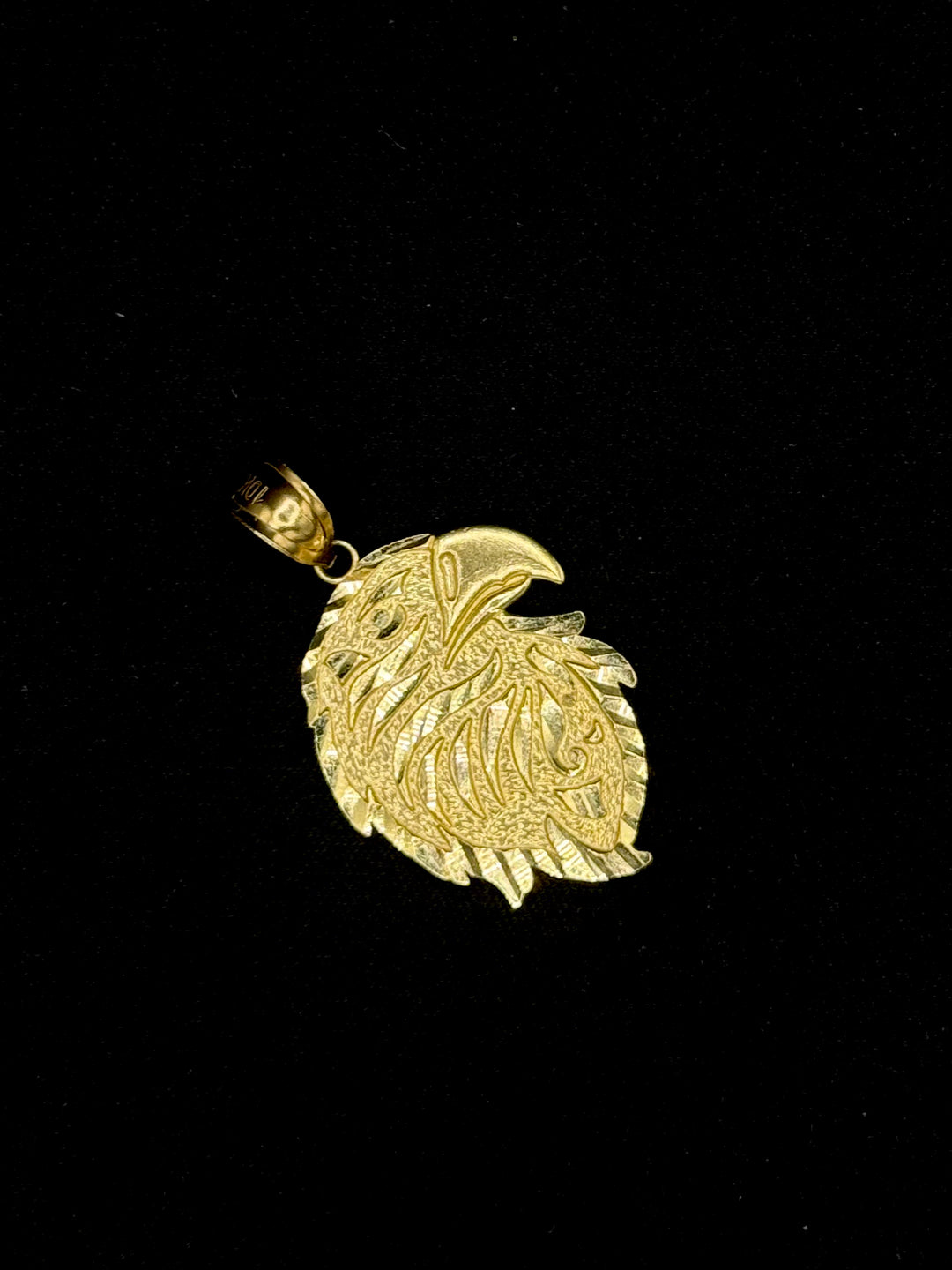 10K GOLD EAGLE HEAD WITH BORDER DIA CUT PENDANT
