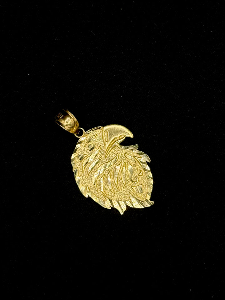 10K GOLD EAGLE HEAD WITH BORDER DIA CUT PENDANT