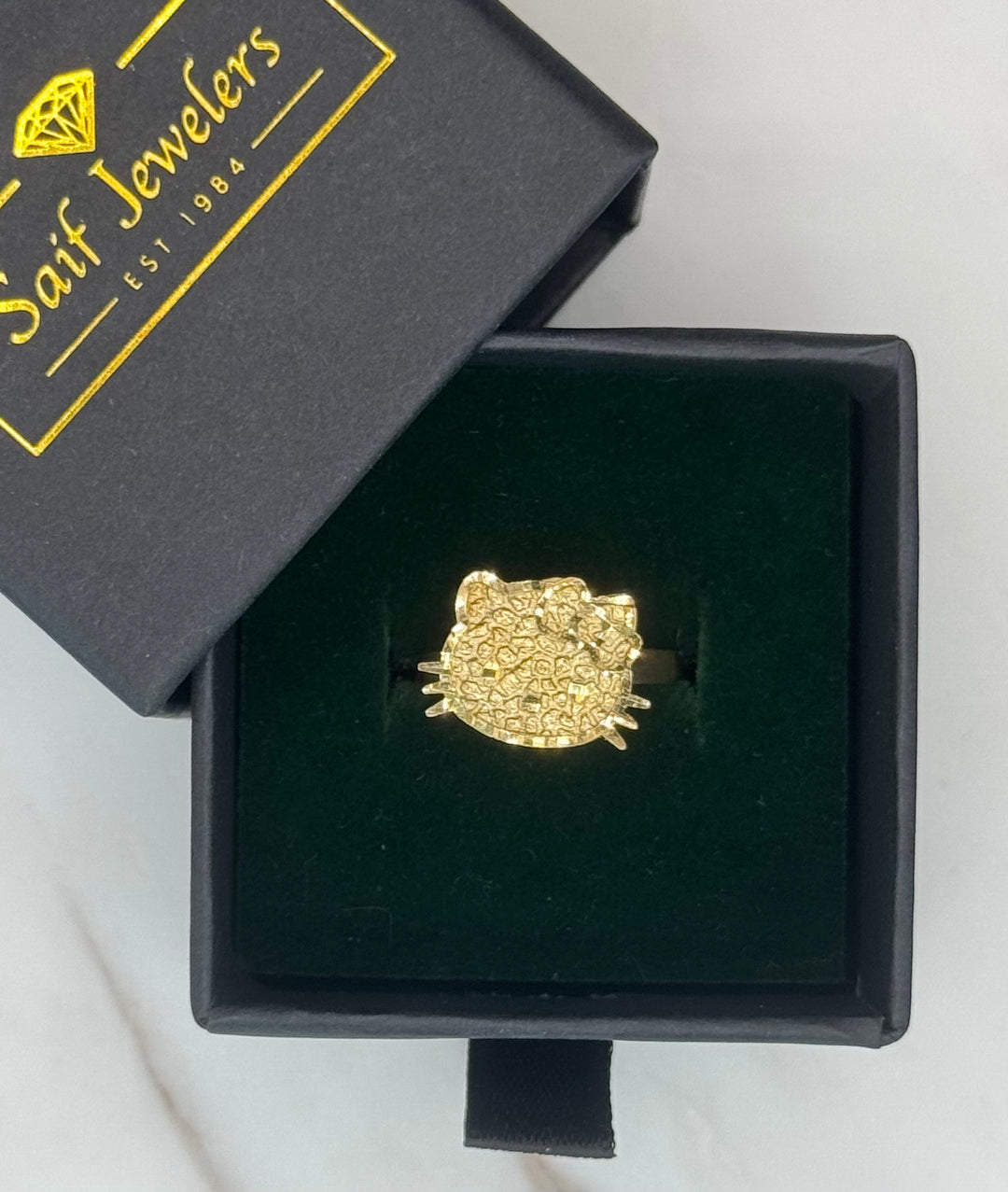 10K GOLD HELLO KITTY FACE RING WITH NUGGET PRINT