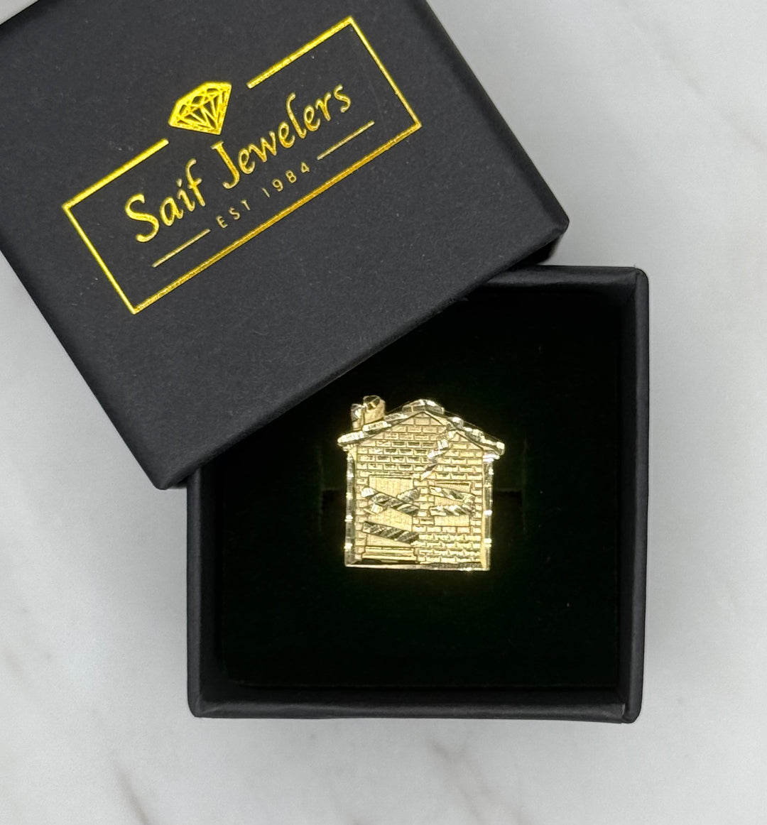 10K GOLD TRAP HOUSE DIA CUT RING