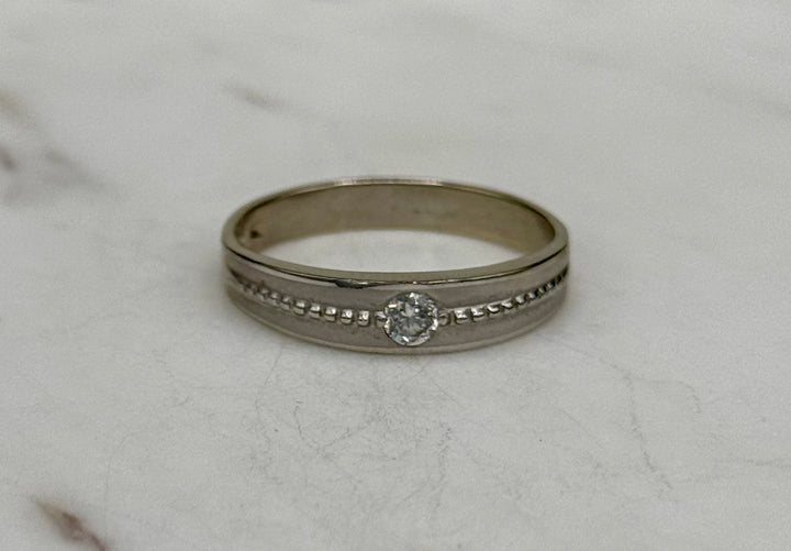 10K WHITE GOLD BRAIDED CZ BAND