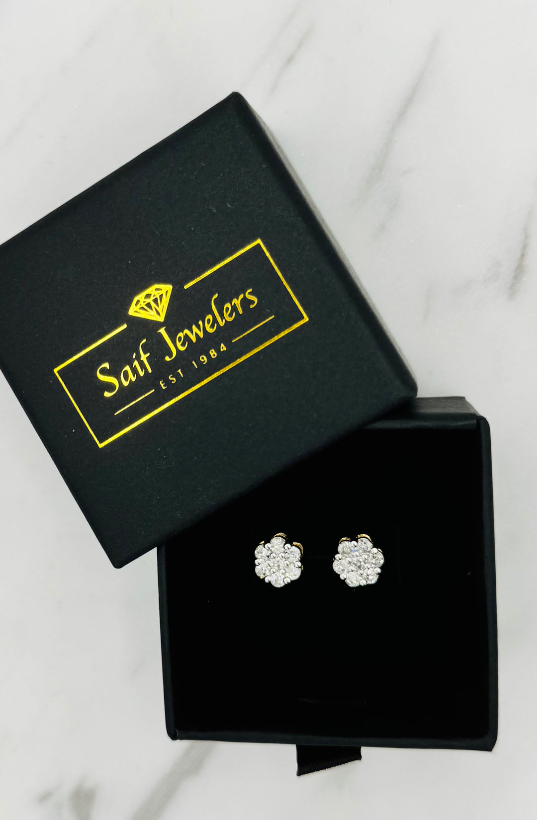 10K GOLD DIAMOND FLOWER STUDS