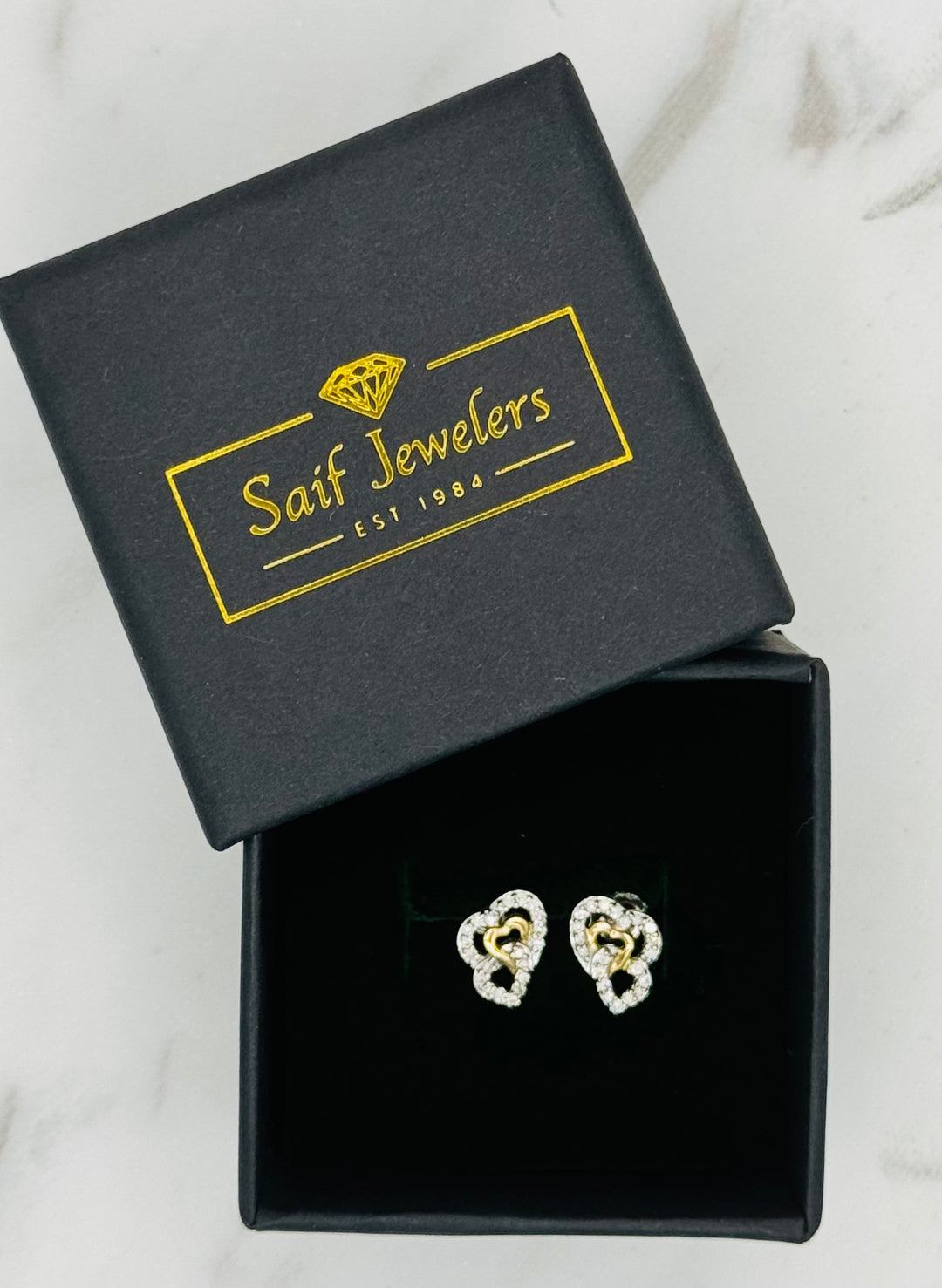 14K GOLD TWO TONE TRIPLE HEART DIAMOND STUDS