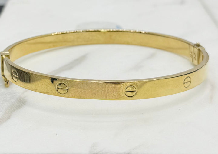 10K YELLOW GOLD LOVE BANGLE