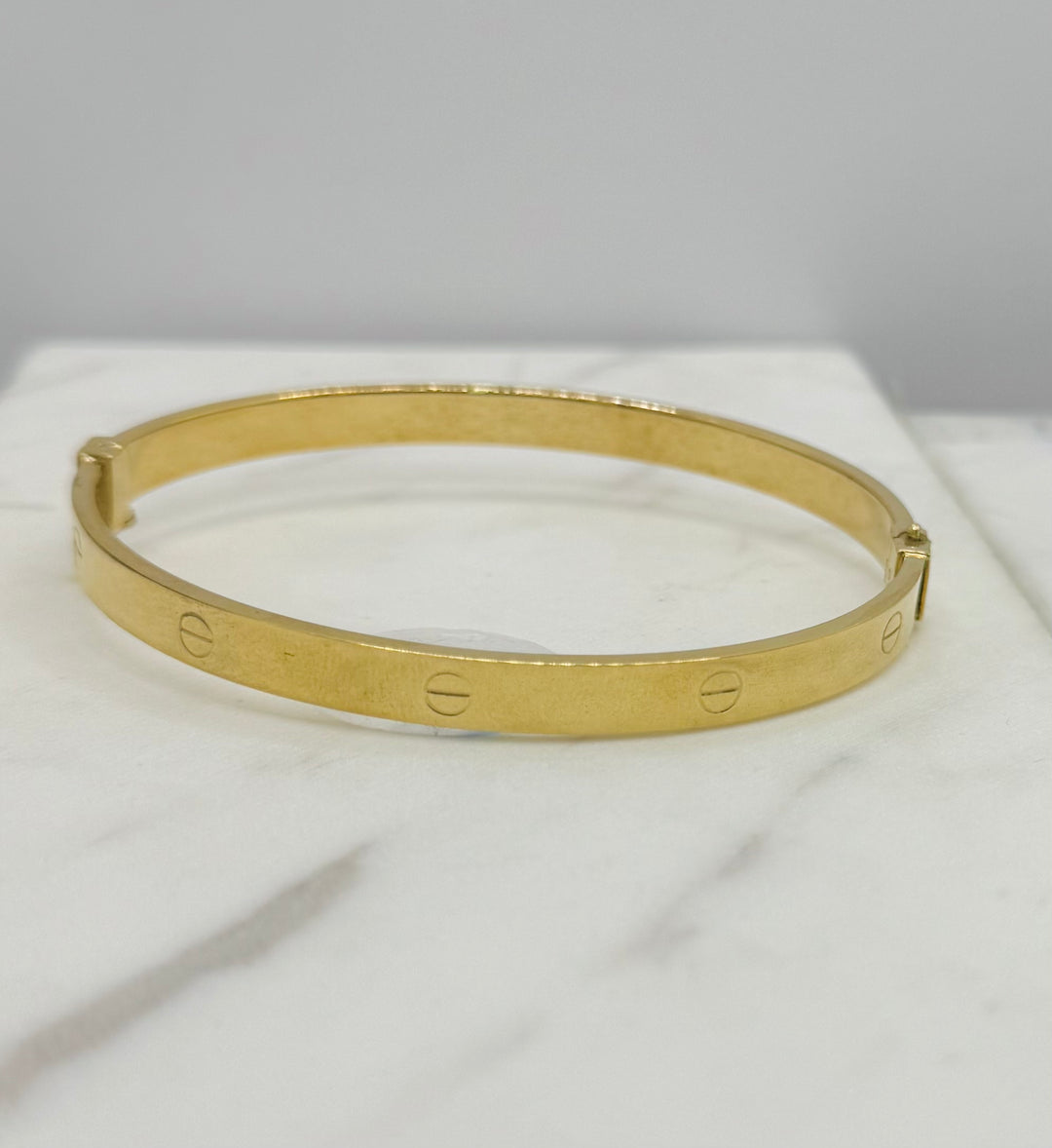 10K YELLOW GOLD LOVE BANGLE