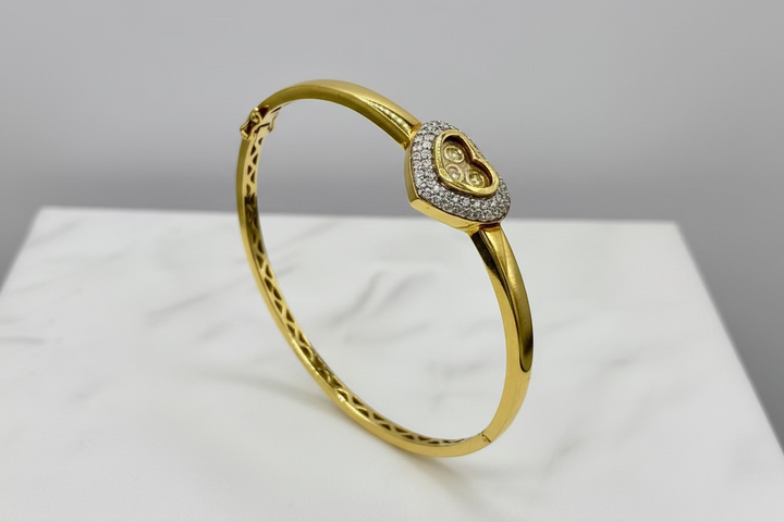 18K Y/G CHOPARD HAPPY DIAMOND BRACELET 1.00CT