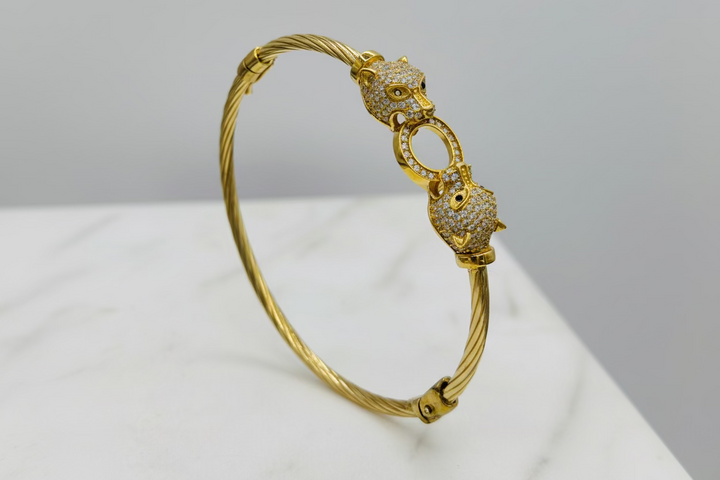 10K Y/G TIGER BANGLE WITH CZ