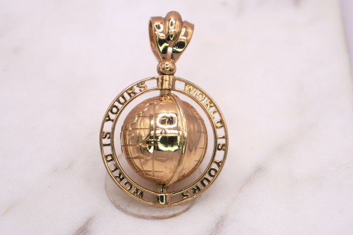 10K WORLD IS YOURS PENDANT