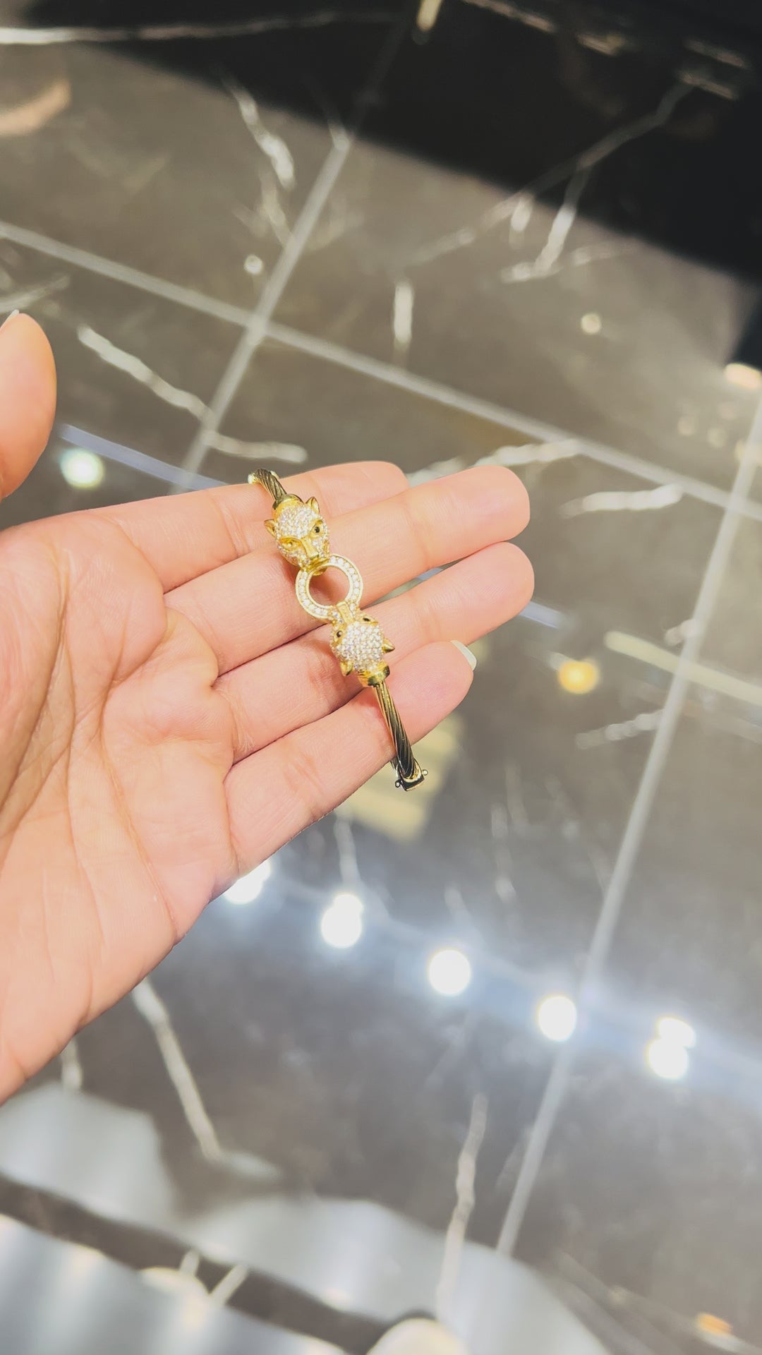 10K Y/G TIGER BANGLE WITH CZ