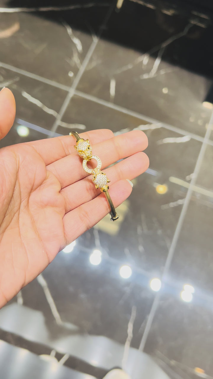 10K Y/G TIGER BANGLE WITH CZ